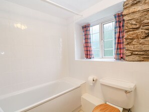 Combined shower/bathtub, towels, soap
