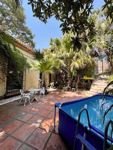 Manor house with large tropical garden, swimming pool and spectacular views.