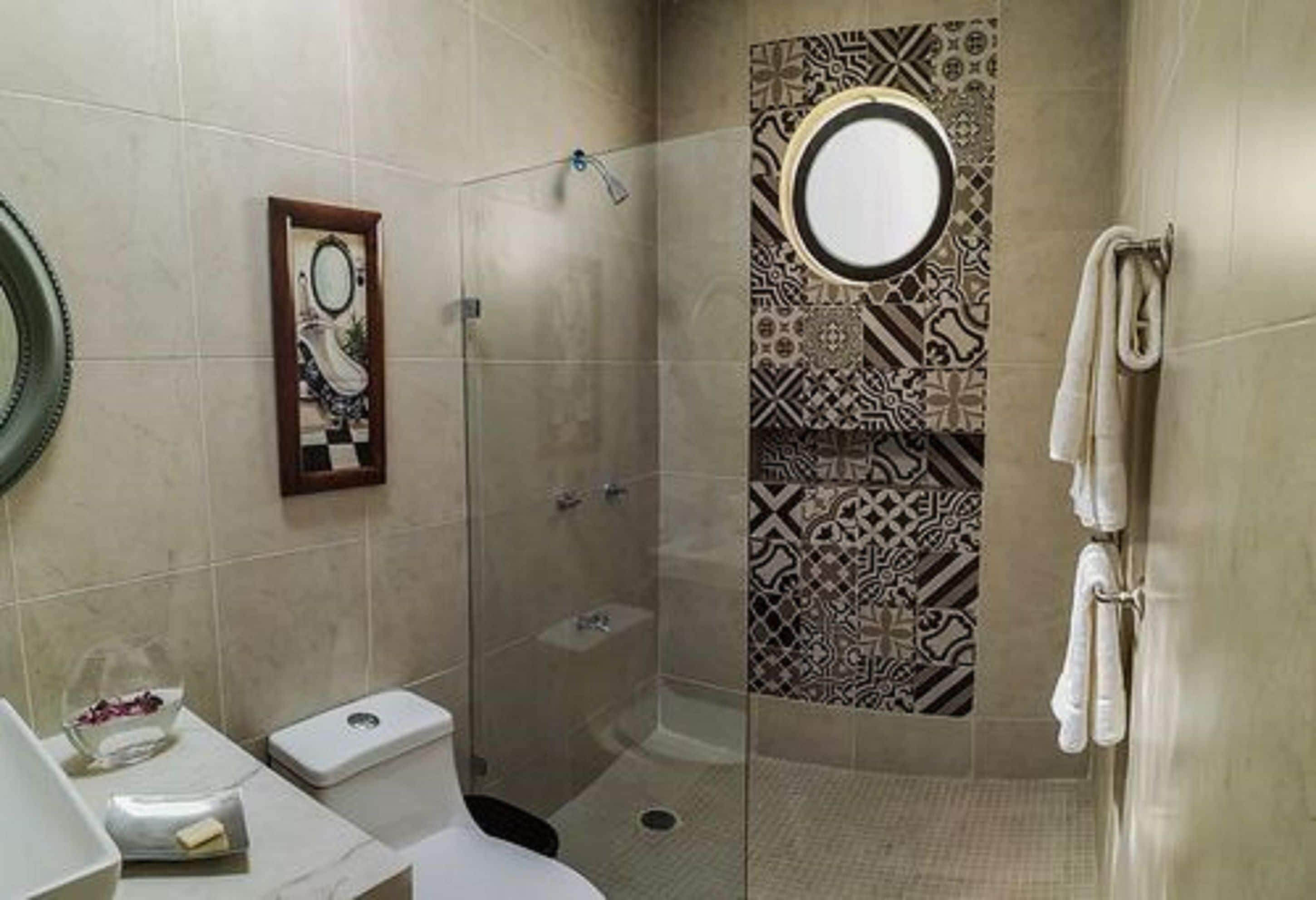 family suite, non smoking, city view | bathroom | shower, rainfall showerhead, free toiletries, towels