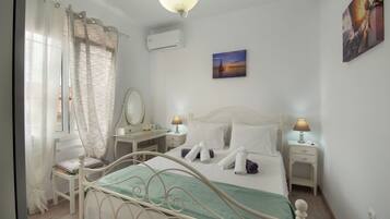 2 bedrooms, iron/ironing board, travel crib, internet