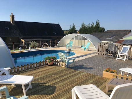 A heated pool. "Quaint French Cottage"