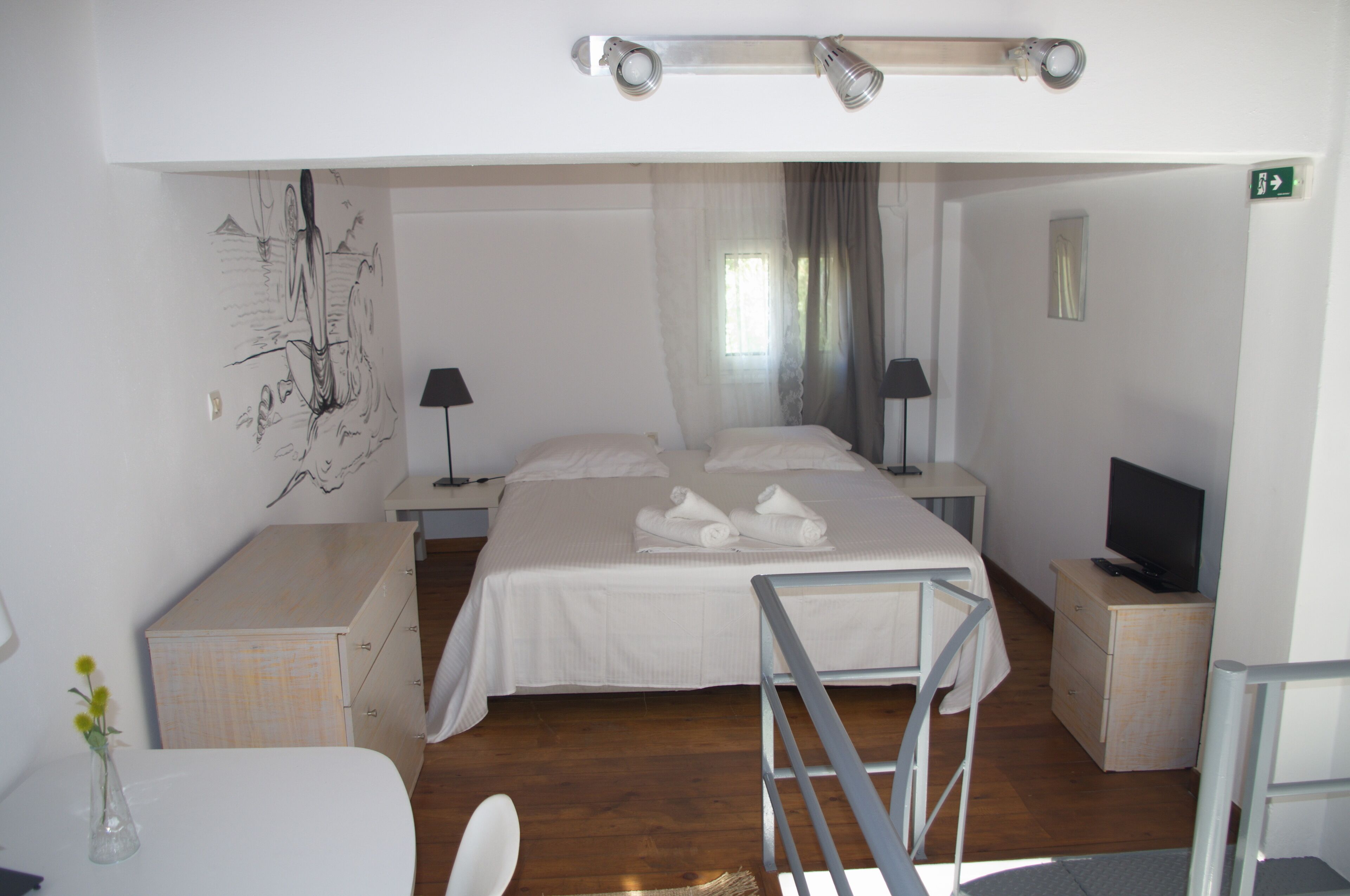 Romalea’s Apartments little village organic garden