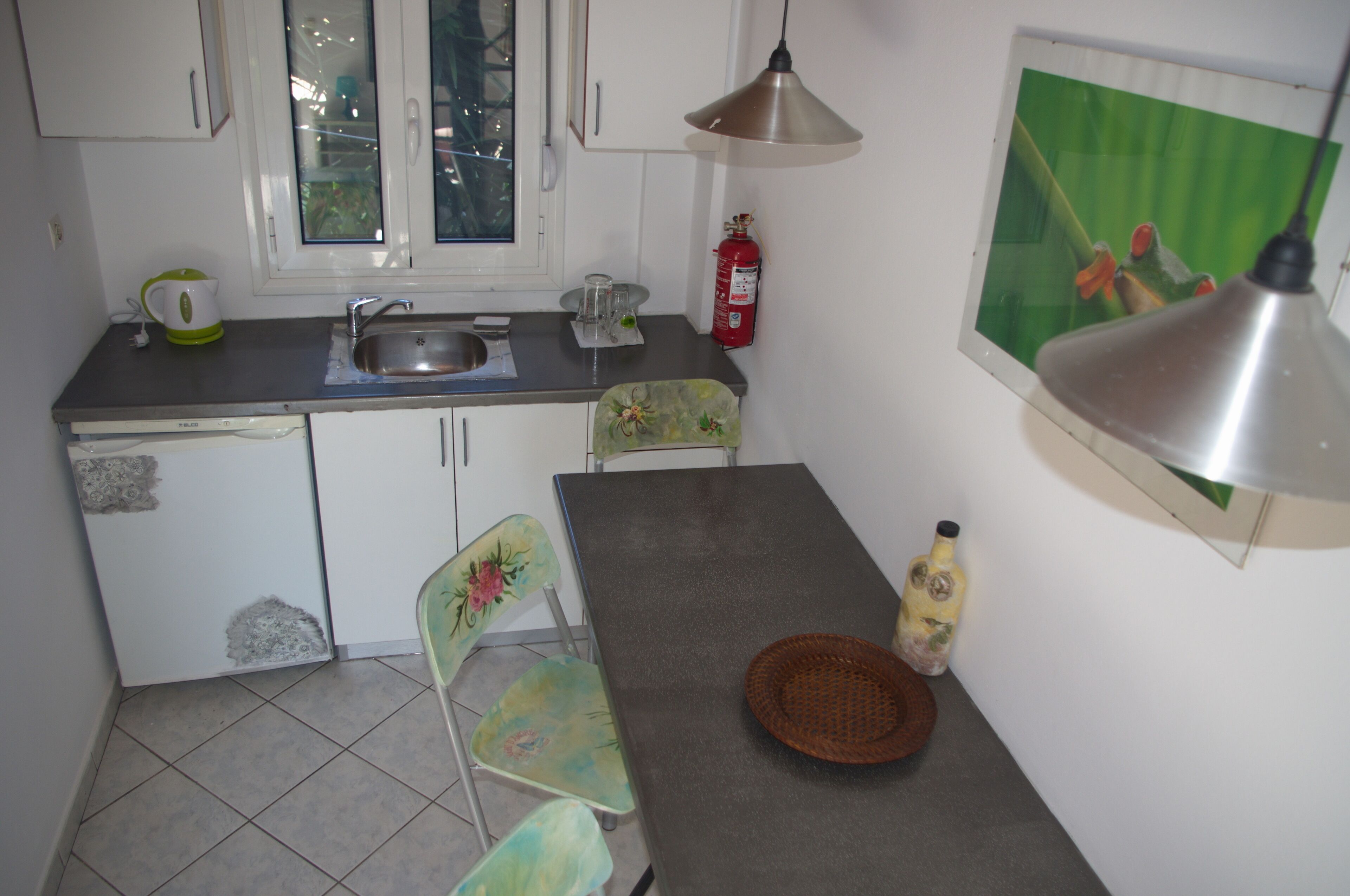 Romalea’s Apartments little village organic garden