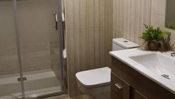 Hair dryer, towels, soap, shampoo