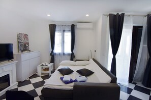 1 chambre, coffres-forts dans les chambres, fer et planche à repasser