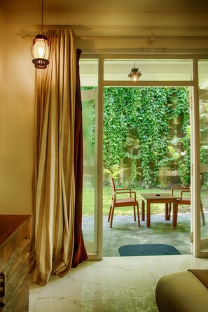 Deluxe Double Room, 1 King Bed, Patio, Garden View | 1 bedroom, premium bedding, Select Comfort beds, in-room safe - Deltora Boutique Hotel (Galle)