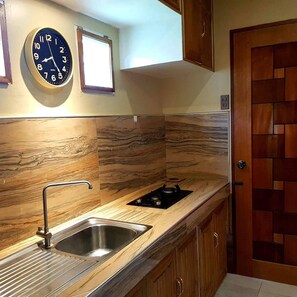 Cottage, Kitchenette | Private kitchenette | Fridge, stovetop, electric kettle, cookware/dishes/utensils - Villa Anastacia White Beach Puerto Galera (Puerto Galera)