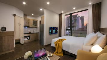 エグゼクティブ スタジオ キングベッド 1 台 浴槽 シティビュー (Deluxe) | 1 室のベッドルーム、セーフティボックス (室内)、デスク、ノートパソコン用作業スペース
