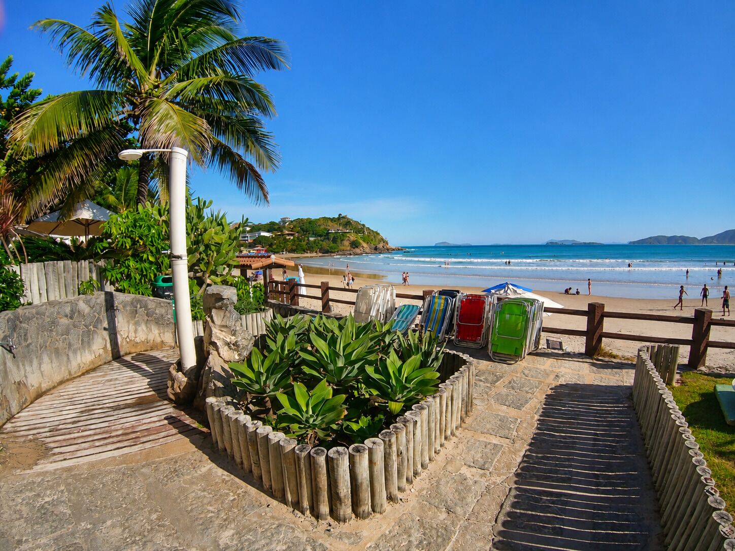 On the beach, sun loungers