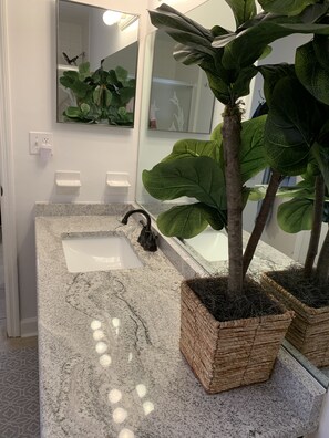 Combined shower/tub, hair dryer, towels, soap