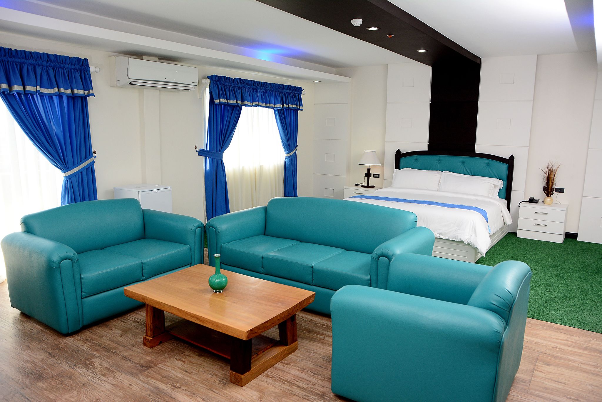 Desk, laptop workspace, blackout drapes, iron/ironing board