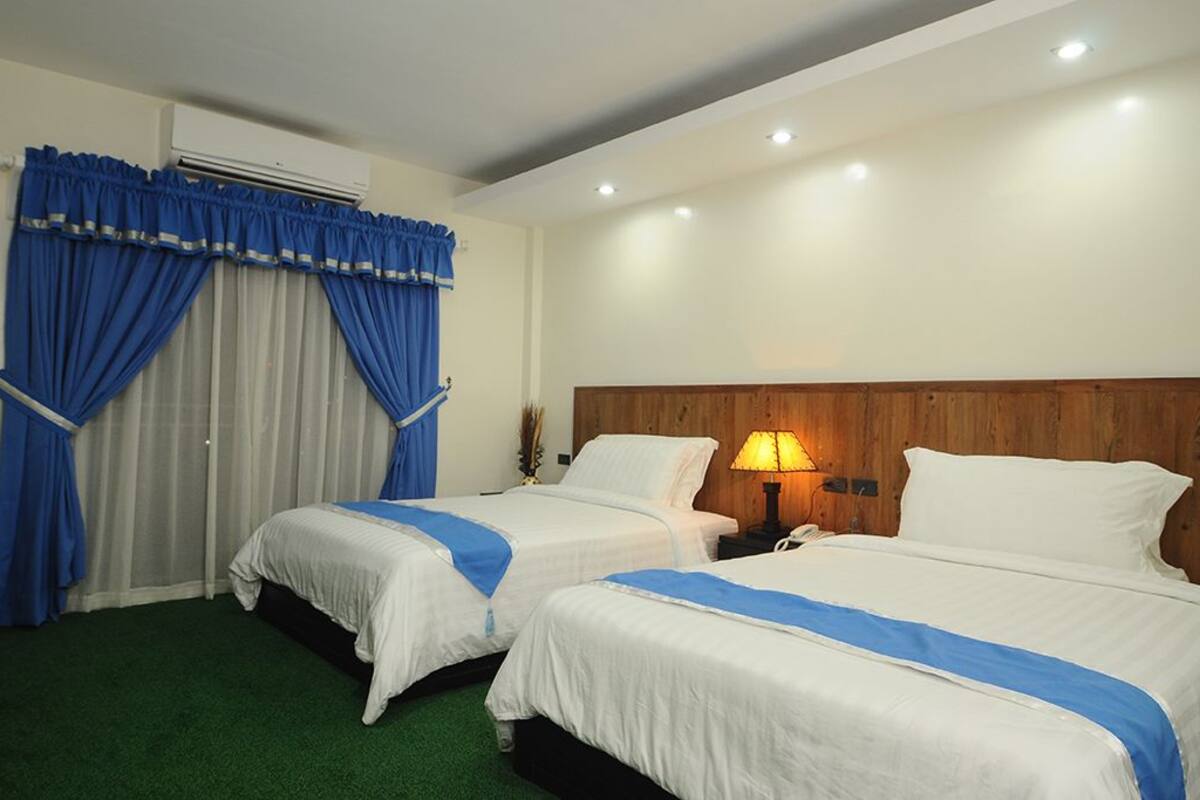 Room, 2 Double Beds, Non Smoking, Mountain View | Desk, laptop workspace, blackout drapes, iron/ironing board (on request)