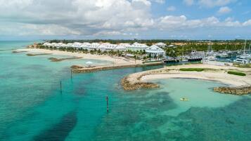 On the beach, sun loungers, beach towels