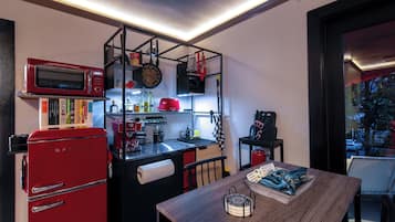 Fridge, microwave, stovetop, coffee/tea maker
