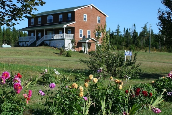 Exterior View from flower beds