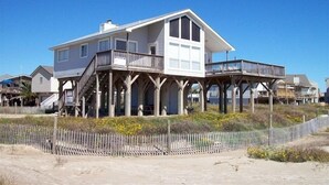 A beachfront house with a balcony and a covered porch. - Beach Front on Galveston's West Beach (Galveston)