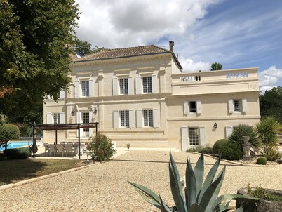 Character house, air-conditioned, heated pool, fenced garden with trees.