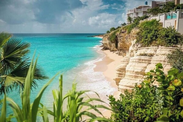 On the beach, sun loungers, beach towels