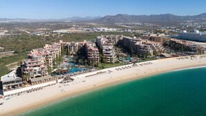 A resort with multiple buildings, a beach, and a pool area. - Luxury Oceanfront Villa - Endless Panoramic Ocean and Pool Views! (Cabo San Lucas)