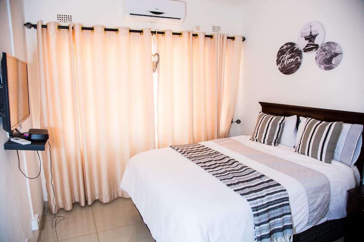 Quarto casal standard, 1 cama de casal, vista para o jardim | Vista do quarto