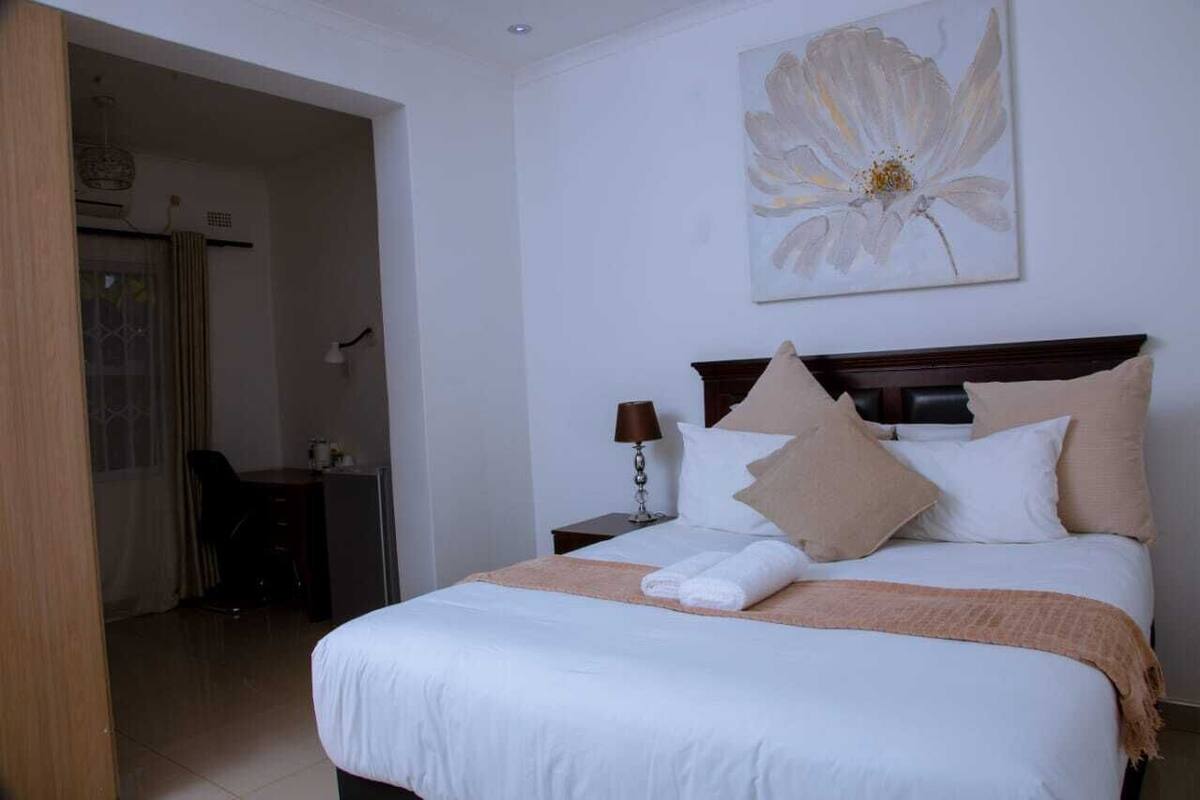 Premium bedding, down duvets, Select Comfort beds, desk