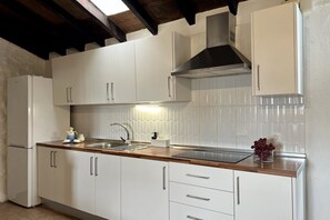 Fridge, microwave, coffee/tea maker, toaster