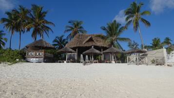 On the beach, white sand