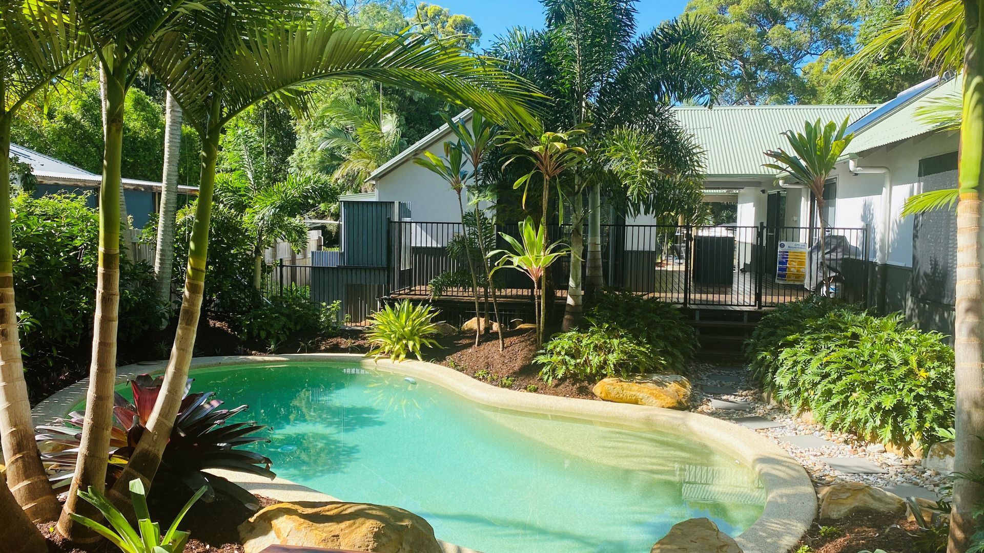 Beautiful stylish beach home with a pool and fire pit