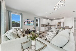 Televisión, consola de videojuegos, futbolito, mesa de ping pong