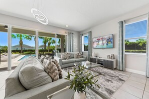 Televisión, consola de videojuegos, futbolito, mesa de ping pong