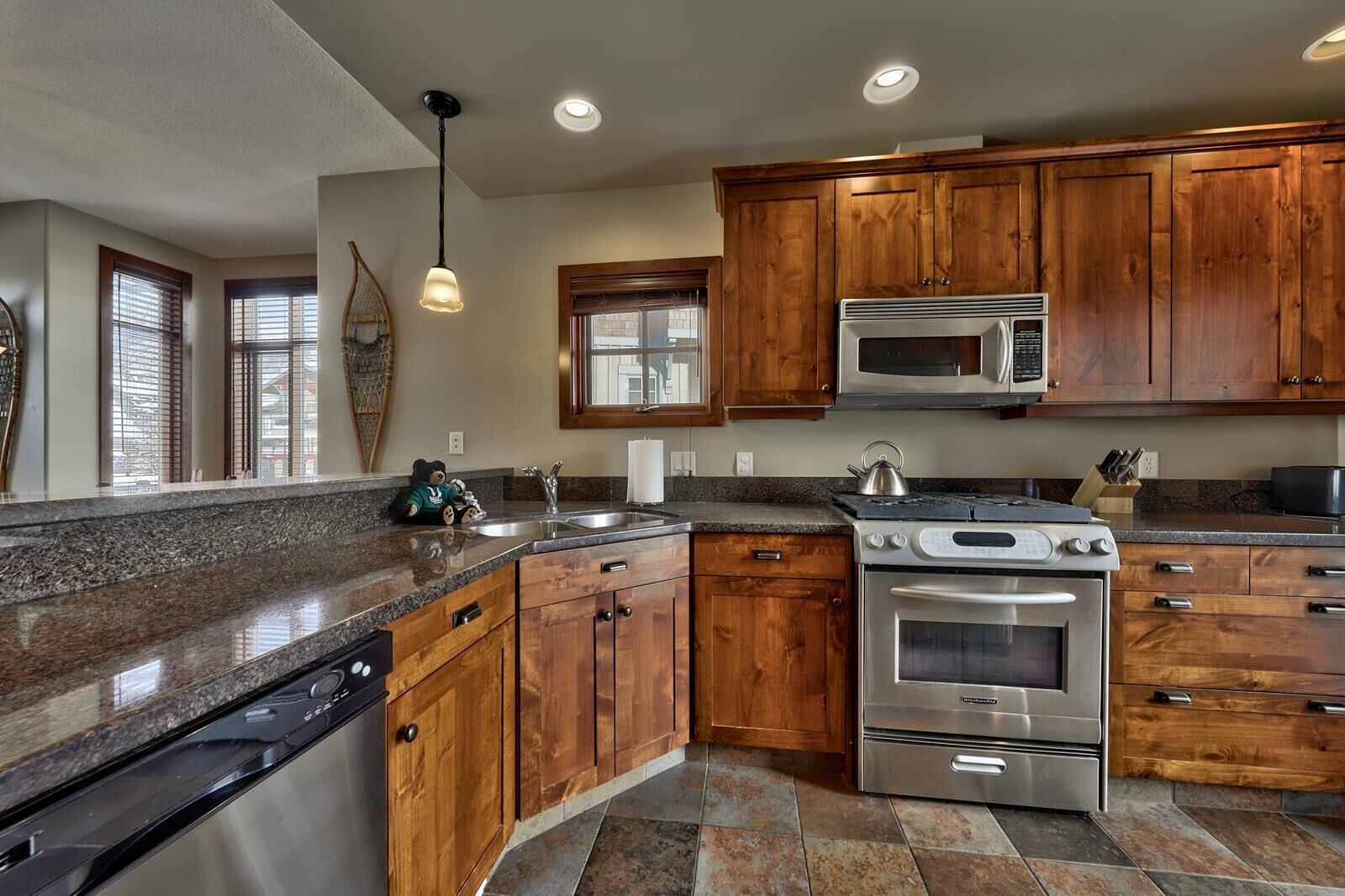 Exceptional multi level 3 bedroom + den townhouse, close to Morrisey lift