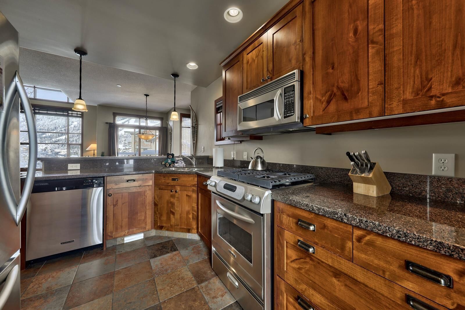 Exceptional multi level 3 bedroom + den townhouse, close to Morrisey lift