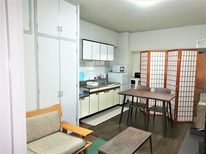 Two-Bedroom Apartment | Living room | LCD TV - Apartment near Tram in Okayama (Okayama)
