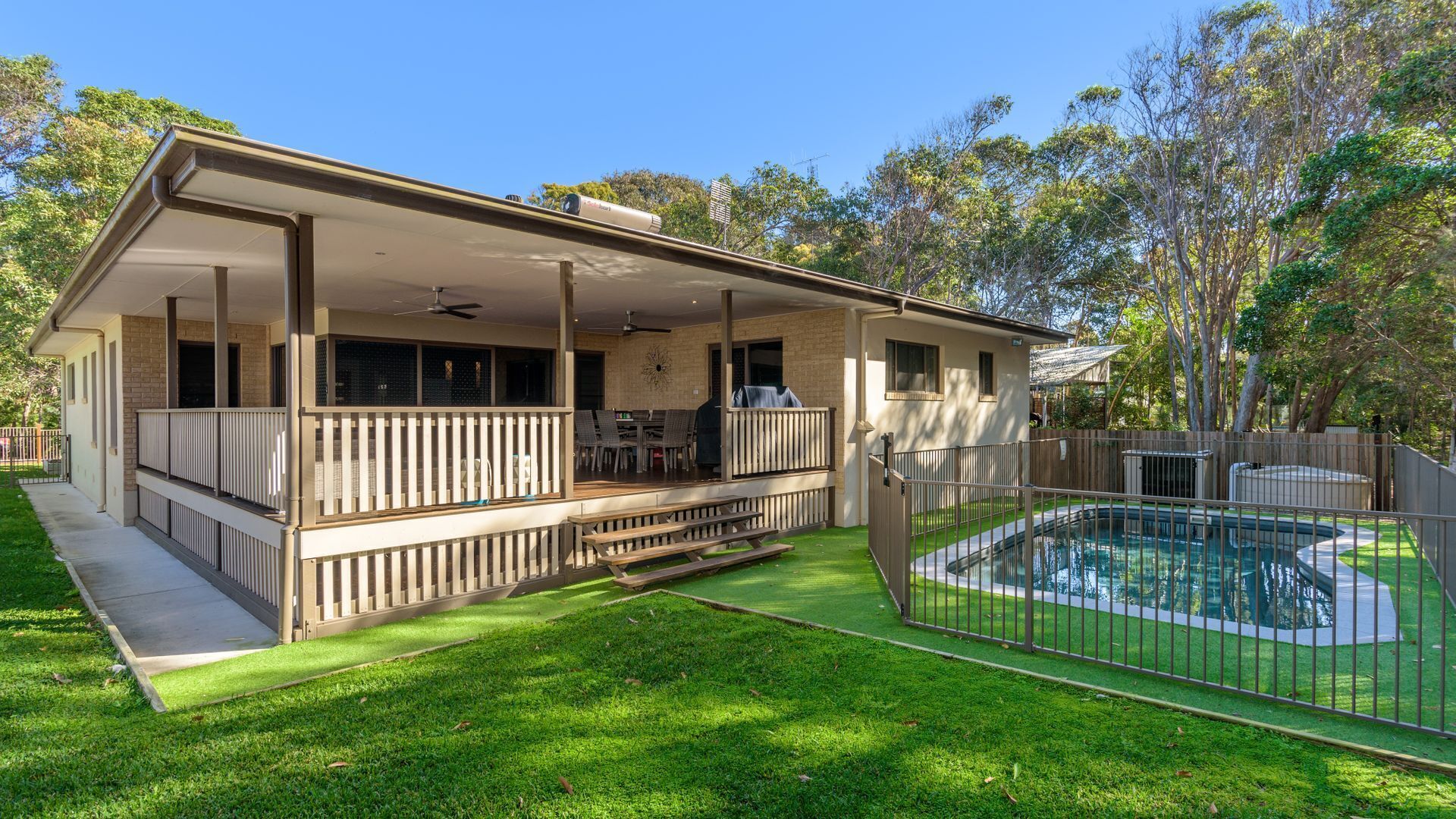 Beautiful 5 bedroom spacious pet friendly home with a pool only steps to the ocean