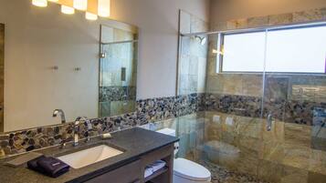 Shower, rainfall showerhead, hair dryer, towels