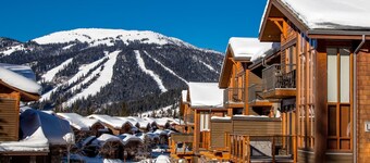Incredible multi level 2 bedroom + den townhouse, close to ski run