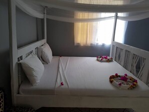 Neljän hengen deluxe-huone, merinäköala