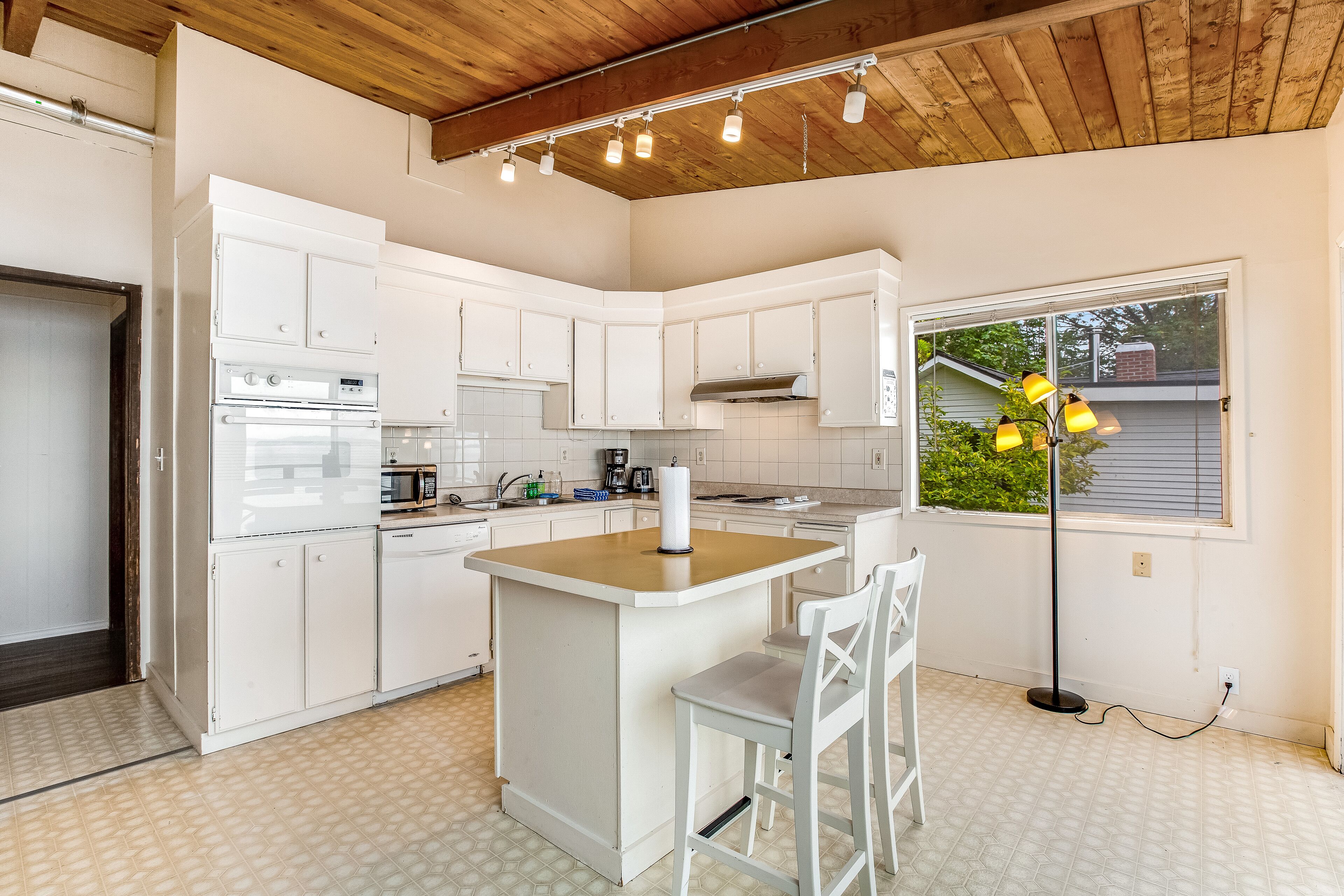 Tranquil waterfront getaway with inviting outdoor decks & beach access