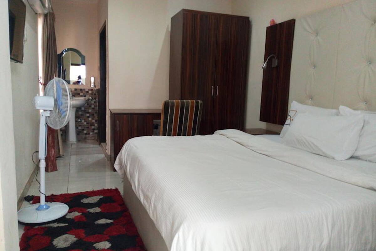 Desk, laptop workspace, free WiFi, bed sheets