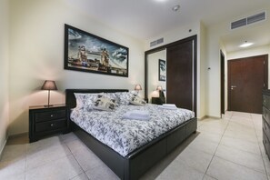 Apartamento, 1 quarto | Roupas de cama premium, cofres nos quartos