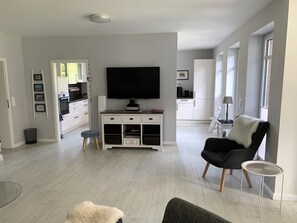 Smart TV, fireplace, DVD player, foosball