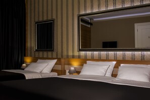 Familie vierpersoonskamer | Luxe beddengoed, Tempur Pedic-bedden, een minibar, een kluis op de kamer