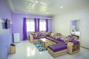 Junior Suite (Eclipse) | Living room | 32-inch flat-screen TV with satellite channels, TV