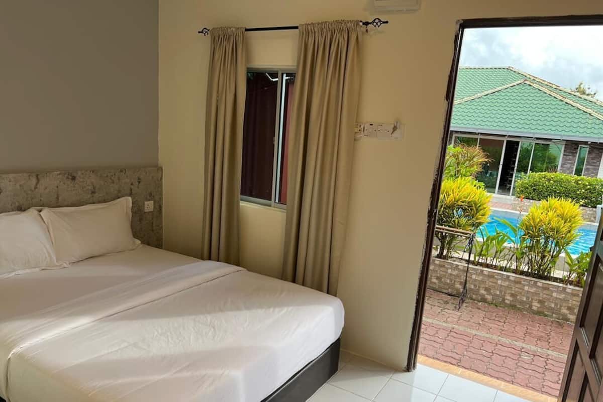 Standard Room, Pool View | In-room safe, desk, laptop workspace, iron/ironing board