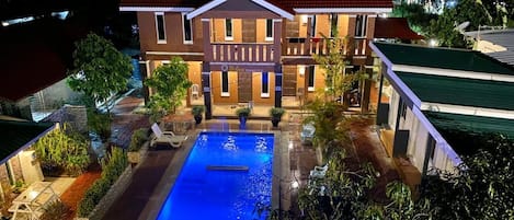 Outdoor pool, open 8:00 AM to 10:00 PM, sun loungers