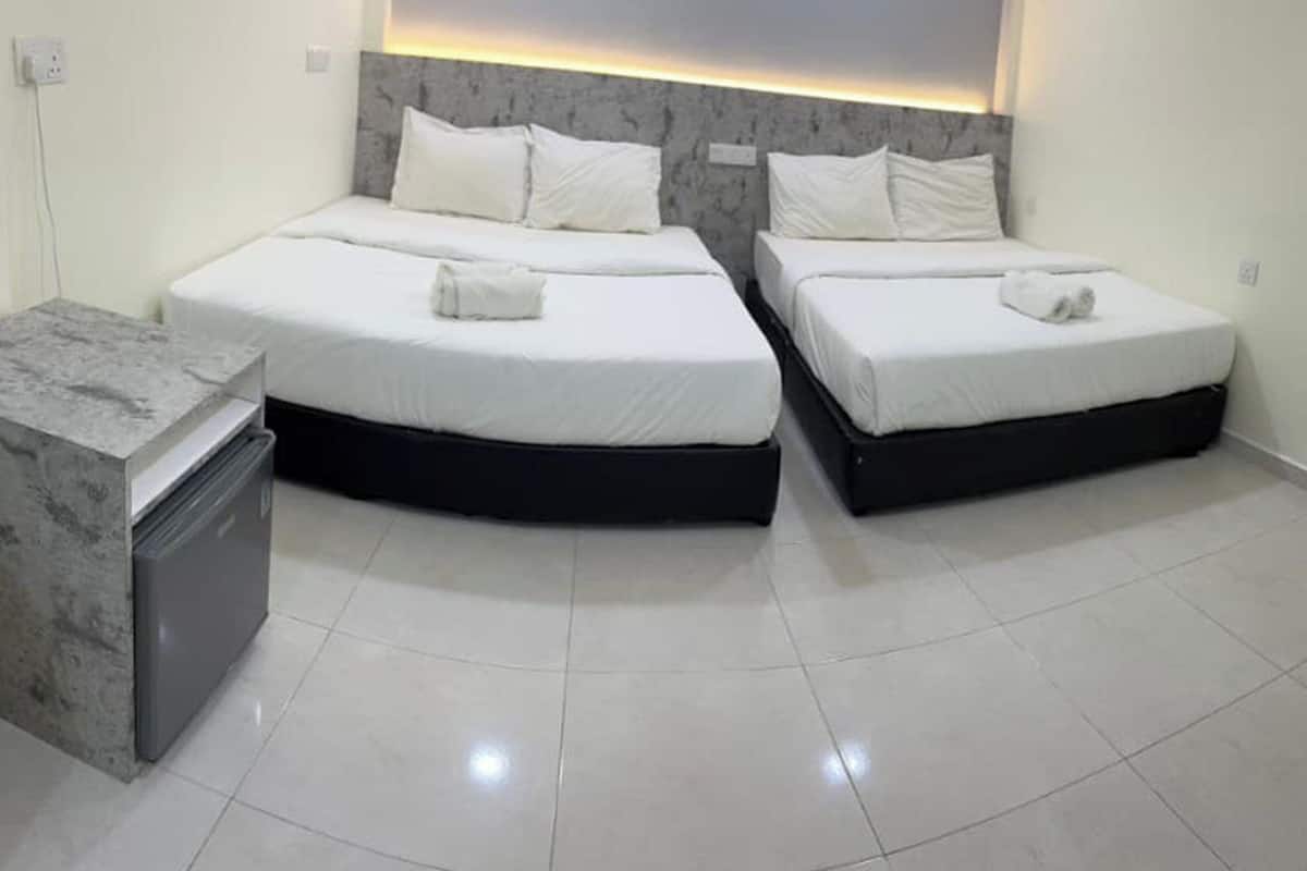Family Room, Garden View | In-room safe, desk, laptop workspace, iron/ironing board