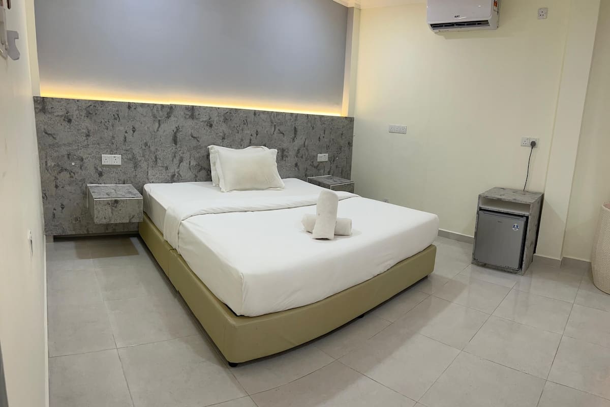 Standard Double Room, Garden View | In-room safe, desk, laptop workspace, iron/ironing board