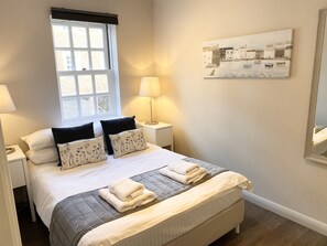 Apartment, 2 Bedrooms | Desk, iron/ironing board, free cots/infant beds, free WiFi