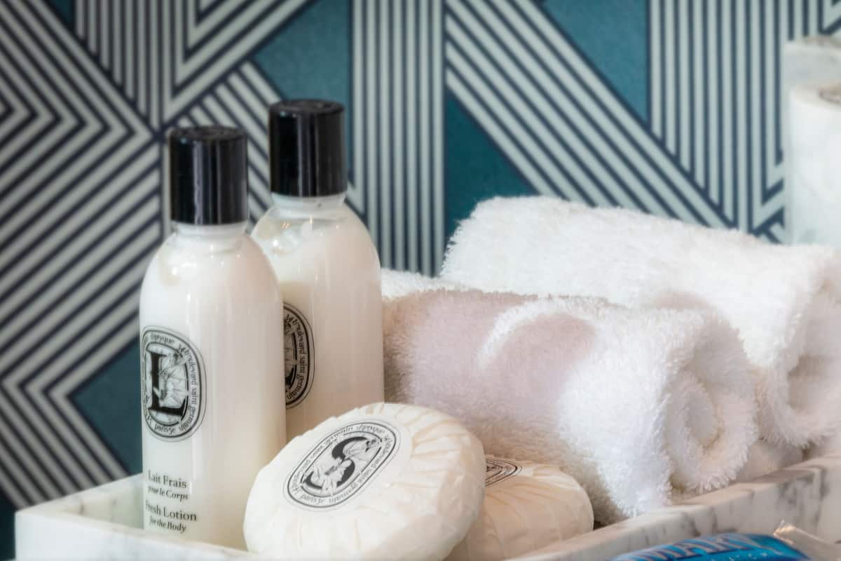 presidential suite | bathroom | designer toiletries, hair dryer, bathrobes, slippers