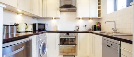 Apartment, 2 Bedrooms | Private kitchen | Full-sized fridge, microwave, oven, stovetop